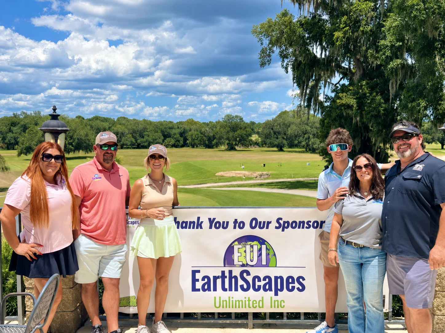 Earthscapes Unlimited team members at a golf event